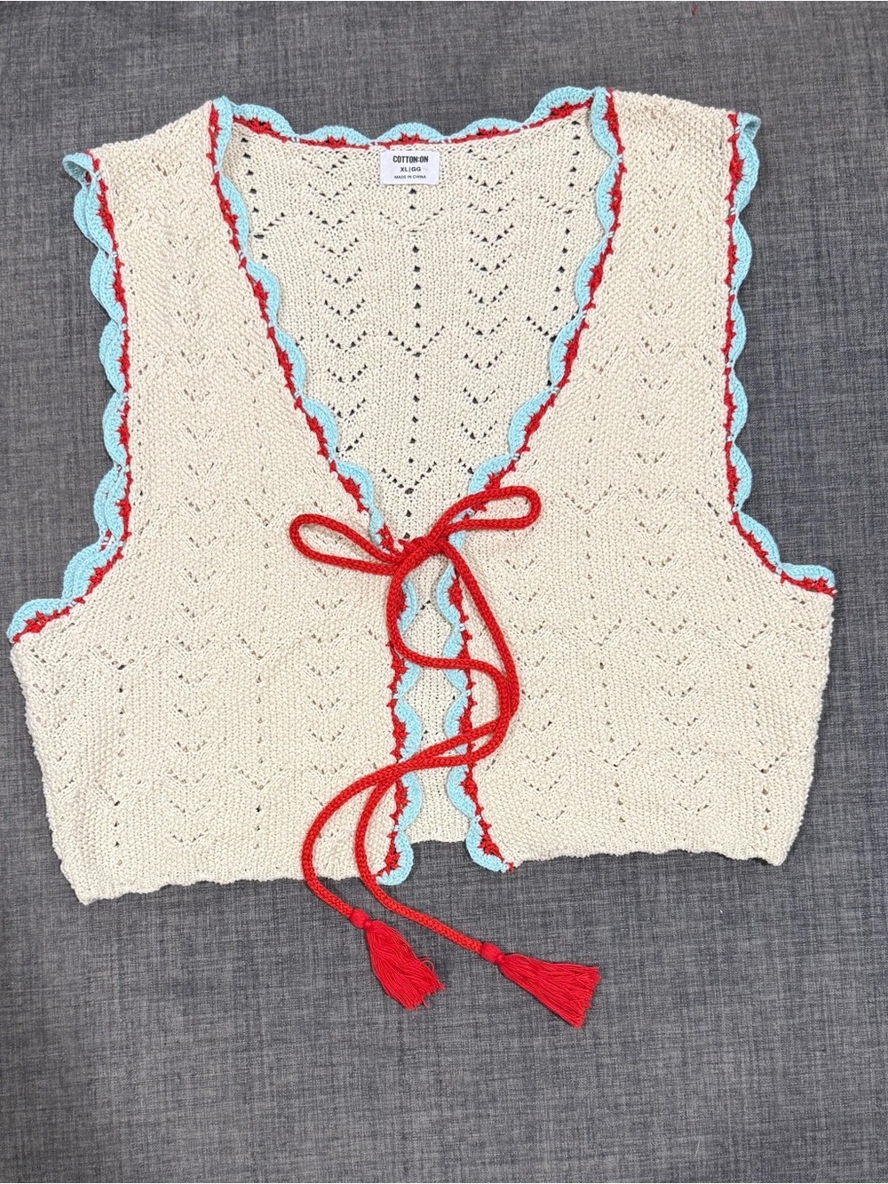 Cotton On Cream Crochet Vest with Red Tie and Light Blue Trim